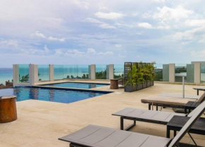 Rooftop Bliss, Steps from Playas Best Beach